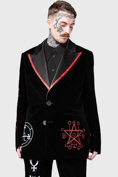 BEELZEBUB.- Statement non-stretch velvet fabric.- Contrasting satin collar.- Statement custom embroidery details.- XL peaked lapels.- Functional welt pockets.- Button down closure.- Classic suit jacket sillhouette.- Fitted.- Unisex, so it's for everyone! with KILLSTAR branding, Fabric 1: 100% Polyester. Trim: 97% Polyester, 3% Elastane. Lining: 95% Polyester 5% Elastane.Do not wash / Do not bleach / Do not tumble dry / Do not iron / Dry clean. Imported. Winter Velvet Single-breasted Outerwear, Black Tuxedo Style Outerwear With Shawl Collar, Velvet Tuxedo Style Long Sleeve Outerwear, Velvet Long Sleeve Tuxedo Style Outerwear, Black Single Breasted Blazer With Shawl Collar, Semi-formal Velvet Outerwear With Lapel Collar, Semi-formal Velvet Outerwear With Notch Lapel, Black Single-breasted Blazer With Shawl Collar, Winter Velvet Outerwear With Lapel Collar