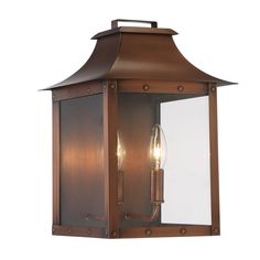 an outdoor wall light with a brown finish and clear glass panels on the front side