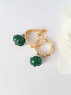 Gold Pearl Summer Earrings, Carved stone and Gold Pleated Hoops, Modern simple design, Gift for her, Bridesmaids earrings Beautiful earrings that just look like summer.  These earrings measure about 3,5 cm the top of the ear posts to the end. The width is about 1cm.  They are made with Gold plated Hoops, Carved green Onyx gemstone  Please allow for slight variations as the beads are natural and each piece is handmade. Thanks! To view my other creations, please visit Etsy.littlewomenbusiness.com Gold Jade Wedding Earrings, Elegant Jade Hoop Earrings, Bridesmaids Earrings, Summer Earrings, Lapis Lazuli Ring, Carved Stone, Ethnic Earrings, Summer Earring, Green Onyx