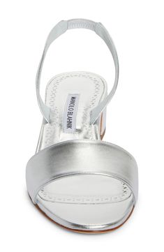 Fashioned from silver metallic leather, this modern sandal is set on a low block heel and secured with a stretchy slingback strap. 1 1/4" heel, 31mm (size 38.5) Elasticized slingback strap Leather upper, lining and sole Made in Italy Designer Shoes Silver Slingback Sandals For Summer, Silver Low Heel Slingback Sandals For Party, Silver Slingback Sandals For Formal Summer Events, Silver Slingback Sandals For Summer Evenings, Silver Leather Slingback Sandals With Removable Insole, Silver Slingback Sandals With Removable Insole, Silver Open Toe Slingback Pumps For Summer, Silver Slingback Sandals For Spring, Silver Slingback Open Heel Sandals For Spring