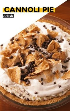 a pie with chocolate chips and cream on top