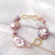 This beautiful Freshwater pearl bracelet ranges between 10-14mm in size and consists of beautiful and lustrous pearls in AAAA+ quality. All pearls in this bracelet are round and are strung with silk thread and double-knotted between each pearl. Known as the 'icon' of cultured pearls, Freshwater pearls have graced the necks, ears, fingers, and wrists of women for decades. Huge Tomato imports their Freshwater pearls from the Freshwater rs of Japan, grown in the Pinctada fucata oyster. All of our F Resin For Beginners, Diy Resin Coasters, Pearl Bracelet Gold, Gold Baroque, Buy Pearls, Freshwater Pearl Jewelry, Gold Armband, Resin Coasters, Freshwater Pearl Bracelet