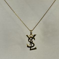 Yves Saint Laurent Ysl Logo Vintage Necklace Preowned/Used Looks Great Please See Photos Purchased As Is Yves Saint Laurent Necklace, Yves Saint Laurent Jewelry, Saint Laurent Necklace, Saint Laurent Jewelry, Ysl Logo, Logo Vintage, Vintage Logo, Vintage Necklace, Womens Jewelry Necklace