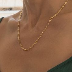 "Oval Link Elongated Chain/ Real Gold Paper Clip Chain Necklace Bracelet / 14k Oval Paper Clip Chain / Layering Chain Gold Paper Clip Choker CHAIN INFO: Width is : 9x4 mm each paper clip peace- average weight is 2 gr for the bracelet and 4.2 gr for the Necklace ( hollow inside) 6.5 \" - 7 \"- 7.5 \"- 8 \"(bracelet) and 16\"- 18\" -20 \" (necklace) Crafted from Pure 14K Gold a Bright & Sturdy Metal . Features a Lobster clasp Lock Closure for safety and security. Available in yellow real gold Paper Clip Chain Necklace, Paper Clip Necklace, Chain Layering, Choker Chain, Layered Chains, Necklace Craft, Average Weight, Gold Paper, Chain Gold