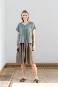 "Handmade with love and care Oeko-tex certified 100% linen skirt which is crafted by local tailors in Lithuania (EU member). It goes perfectly with any of our blouses (you will find below some recommendations)! Look sharp all day long! Length: ±24\"/60cm Pockets: side seam Waistband: elastic Details: *Colour shown: wood brown (1st picture) *Model is wearing size M *High-waisted *Deep pockets *Medium weight (185 g) *Not-ironed (and no need to) *Handcrafted by @LinenCloud Easy care: - Machine wash Green Linen Relaxed Fit Skirt, Casual Linen Tiered Skirt, Casual Linen Tiered Skirt Bottoms, Linen Green Lined Skirt Bottoms, Green Linen Lined Skirt Bottoms, Casual Green Linen Skirt, Casual Linen Lined Skirt, Casual Linen Pleated Skirt, Linen Skirt With Relaxed Fit And Lining