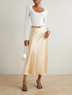 Galvan's 'Valletta' skirt works well for many different occasions. It's made from lustrous satin that's cut on the bias for a beautiful drape and sits comfortably at your natural waist. Wear yours with a tonal camisole and neutral or metallic accessories. Luxury Skirt For Gala, Luxury Silk Skirt For Party, Luxury Silk Party Skirt, Elegant Satin Skirt For Gala, Elegant Asymmetrical Bias Cut Skirt, Silk Lined Skirt For Gala, Elegant Bias Cut Asymmetrical Skirt, Formal Bias Cut Relaxed Skirt, Elegant Satin Mini Skirt