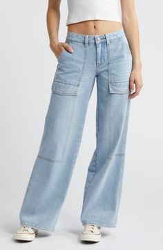 Make a statement in Y2K-inspired nonstretch jeans flaunting a low-rise waist, full-length wide legs and trend-right cargo pockets. 33" inseam; 23" leg opening; 10" front rise; 14" back rise (size 29) Zip fly with button closure Front slant pockets; back flap-patch pockets 100% cotton Machine wash, tumble dry Imported Spring Mid-rise Cargo Jeans With Pockets, Spring Full Length Flare Jeans With Pockets, Medium Wash Relaxed Fit Utility Flare Jeans, Utility Relaxed Fit Medium Wash Flare Jeans, Utility Style Medium Wash Relaxed Fit Flare Jeans, Versatile Denim Flare Jeans With Pockets, Fall Utility Cargo Jeans For Elevated Casual Wear, Utility Cargo Jeans For Elevated Casual Fall, Spring Cargo Jeans In Medium Wash