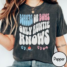 a woman wearing a t - shirt that says badgerers or bows only huntie knows