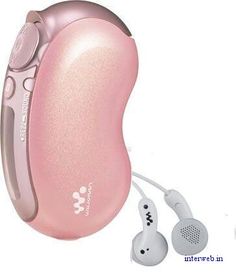 an electronic device with ear buds attached to it's back end and headphones on the side