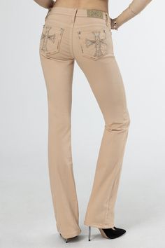 Mid-rise, beige bootcut jeans- Embroidered cross design outlined with beige leather appliqués and metallic stitching- Mini rhinestone rivets and clear sequin details- Rhinestone rivets- Embossed beige leather cross Miss Me brand patch- 5-pocket design Model is wearing size: 25 Model Measurements:Height: 5'10"Bust: 32"Waist: 25.5"Hips: 36"Fabric Content: 52% Cotton, 27% Lyocell, 20% Polyester, 1% ElastaneCare: Gentle machine wash inside-out with like colors in cold water. Tumble dry low. Style No Low Rise Trousers Outfit, Low Rise Trousers, Black Bootcut Jeans, Fran Fine, Embroidered Cross, Jeans Embroidered, Straight Clothes, Cross Design, Boot Cut Denim