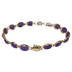 The 'Tibetan Purple Jade Bracelet' takes inspiration from the tallest mountain range in the world. Where the peaks of Jade are counter-balanced by the valleys, portrayed by the Gold links. This Purple Jade variant portrays the royalty of the Himalayan minerals. Each Purple Jade cabochon bead represents one of the tallest 16 Himalayan mountains, housed in Tibet. We incorporate our signature 14K Yellow Gold Clasp for the best wearing experience. The Gold is 14K Hallmark Stamped for authenticity an Himalayan Mountains, Purple Jade, Jade Bracelet, Purple Lavender, Mountain Range, Tibet, Beaded Bracelet, Hallmark, Hong Kong