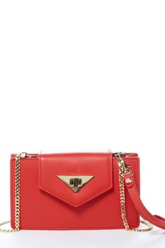 MARY BOLD RED LEATHER WRISTLET WITH GOLD TWIST LOCK AND CHAIN. The Mary is a modern, geometric take on the classic crossbody wristlet. With a boxy structure and a sturdy, angular flap, this bag’s put together look will serve as a boost to your confidence. Composed of show stopping bold red leather, you are sure to feel stylish with the Mary on hand. A twist lock is placed sleekly within a statement piece of gold accent hardware to keep the flap in place. The sharp angles throughout the design of Leather Wristlet, Look Fashion, Leather Crossbody Bag, Classy Outfits