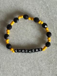 Show your school spirit and support for Wichita State University with our Shockers friendship bracelet! This bracelet is a stylish and meaningful way to represent your pride in WSU, whether you're a student, alumni, or a devoted fan. Wichita State University, Wichita Ks, A Student, School Spirit, Friendship Bracelet, State University, Friendship Bracelets, Jewelry Bracelets, University