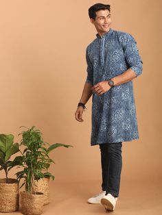 Vastramay Men's Blue Dot Printed Denim Kurta Elevate your ethnic style with this trendy blue dot printed denim kurta. It features a mandarin collar, long sleeves, and a button placket for a comfortable and stylish fit. Pair it with a white pyjama or fitted jeans for a complete look. Key Features Blue colored dot printed denim fabric Straight knee length kurta Mandarin collar Long sleeves with button cuffs Button placket closure Side slits Specifications Sleeve Length -Full Sleeves Shape - Straight Top Length - Knee Length Neck - Mandarin Collar Material & Care Top Fabric - Cotton Dry Clean Legal Disclaimer: The product is guaranteed to be 100% genuine. Product images are for illustrative purposes only. Images/packaging/ labels may vary from time to time due to changes made by the manufactu Kurta And Jeans Men, Traditional Long Sleeve Kurta With Relaxed Fit, Casual Blue Kurta For Festive Occasions, Casual Blue Kurta For Eid, Blue Casual Kurta For Eid, Blue Casual Kurta For Festive Occasions, Spring Long Sleeve Kurta With Bandhani Print, Casual Blue Festive Kurta, Blue Casual Festive Kurta