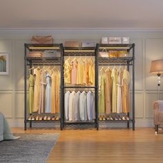 an open closet with clothes hanging on racks and a chair in the corner next to it