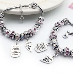 FREE SHIPPING ON ORDERS OVER $75 "The Love Between a Mother and Daughter is Forever" Mother and daughters share a very special bond... Celebrate this special relationship with a set of beautiful Mother Daughter Eternal Love Bracelets. Each charm represents a special connection between a mother and a daughter. Surprise her with this beautiful gift today! "My daughter absolutely loved it. Just a reminder that I’m always here for her. Great quality of the bracelet. Worth every penny." - Brittany B. Mother And Daughters, Mother Daughter Bracelets, Customizable Jewelry, Bracelets Set, A Daughter, Eternal Love, Love Bracelets, Mothers Love, Tiffany Heart