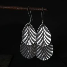 Sterling silver leaf design dangle earrings Approximately H 2.25 X W 1 inches Silver Leaf-shaped Handmade Earrings, Sterling Silver Leaf-shaped Jewelry With Ear Wire, Sterling Silver Leaf-shaped Earrings, Nickel-free Leaf-shaped Sterling Silver Earrings, Silver Leaf-shaped Jewelry With Ear Wire, Sterling Silver Leaf Earrings With Ear Wire, Minimalist Leaf-shaped Sterling Silver Earrings, Minimalist Sterling Silver Leaf-shaped Earrings, Silver Nature-inspired Nickel-free Earrings