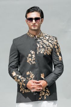 Welcome to Shiraz Saeed Our Retail Store: Rubina's Collection 2070 W Spring creek Pkwy Suite 328 Plano,TX USA 75023 Presenting Men's Black Embroidered Suiting Prince Coat (Kindly provide your size upon checkout) Color: Black Premium Suiting Fabric with Hand Embroidery on Front, Sleeves and Neck. Italian Thread Simple & Decent Metal Buttons Finest Stitch Branded Design Custom Sizes are also available. Fit Type: Regular fit Wash Care Instructions: Dry Clean Only Suitable For India Wedding, Festivals And Social Gatherings Disclaimer Due to the photographic lighting & different screen calibrations, the colors of the original product may slightly vary from the picture. Unstitched Floral Embroidered Suits For Eid, Fitted Sherwani With Intricate Embroidery And Long Sleeves, Fitted Long Sleeve Sherwani With Intricate Embroidery, Designer Fitted Bandhgala With Floral Embroidery, Traditional Suits With Floral Embroidery For Eid, Designer Fitted Embroidered Nehru Jacket, Designer Embroidered Fitted Nehru Jacket, Fitted Nehru Jacket With Floral Embroidery For Designer Wear, Fitted Sherwani With Floral Embroidery For Designer Wear