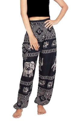 "I love my pants, got so many compliments on them and everyone wanted to know where I got them.  Very stylish and cool ❤️." -Donna O. Experience cool, comfort, and style while showing off your love of elephants!  These are a one-size-fits-all harem pants with a beautiful elephant print design.  They are made from 100% Comfortable Black Wide-leg Harem Pants, Non-stretch Black Printed Bottoms, Non-stretch Printed Black Bottoms, Black Loose Fit Harem Pants, Comfortable Relaxed Fit Black Harem Pants, Trendy Cotton Yoga Pants, Black Cotton Yoga Pants For Summer, Casual Black Cotton Yoga Pants, Black Bohemian Pants For Loungewear