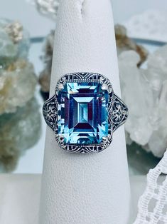 Natural Sky Blue Topaz Ring Blue Square Cut Topaz Ring, Blue Topaz Ring With Square Cut Gemstone, Luxury Blue Rings With Rectangular Stone, Blue Square Cut Topaz Ring Gift, Gift Blue Square Cut Topaz Ring, Luxury Blue Square Cut Ring, Classic Blue Square Cut Rings, Luxury Blue Rectangular Stone Rings, Elegant Topaz Rings With Rectangular Stone