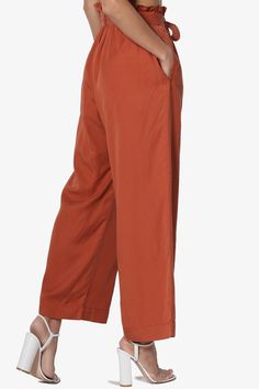 Upgrade your look with chic culotte pants, styled with an detachable tie belt and elastic paperbag waist. A high-waist hits just right and falls into a wide leg crop fit. Pair these with the Crop Top for full effect.Tencel woven, high rise with paperbag pleats, Pull onElasticized waist, Detachable sash tie beltWide leg, cropped length, side slant pocketsSize Guide : Fits true to size, take your normal size(S=1-3, M=5-7, L=9-11)Model size : 5'3" height, 34" bust, 24" waist, 34" hip, Normally wear Versatile Belted Wide Leg Pants, Spring Solid Wide Leg Pants With Tie Waist, Belted Wide Leg Cotton Pants, Relaxed Fit Wide Leg Pants With Tie Waist, Cotton Ankle-length Culottes In Solid Color, Belted Wide Leg Pants For Spring, Spring Solid Color Belted Wide Leg Pants, Wide Leg Pants With Tie Waist For Daywear, Fall Wide Leg Pants With Tie Waist