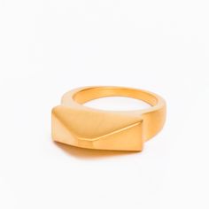 Pris Mini 18K gold plated recycled brass ring. Overall Pyramid: 11/16" x 3/8" / 1.7cm x 1cm Fit: True to size Laser logo engraving Nickel free gold plating Base metal is recycled brass Handcrafted MYW05GP010 FINAL SALE Modern Gold Midi Rings In Recycled Gold, Gold Matte Finish Jewelry Gift, Matte Finish Gold Jewelry Gift, Modern Gold Jewelry With Matte Finish, Minimalist Gold Jewelry With Matte Finish, Minimalist Matte Gold Jewelry, Modern Matte Finish Gold Jewelry, Minimalist Matte Finish Gold Jewelry, Gold Brass Signet Ring For Everyday