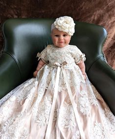 Introducing the Eliana Satin Tulle Christening Gown from Blush Kids, a masterpiece in Champagne hue that redefines heirloom quality for your little angel's significant day. Featuring a majestic dress length of 35 inches with elegant short sleeves, this gown has been meticulously designed to capture the essence of grace and tradition. Crafted with an unwavering attention to detail, it boasts a luxurious blend of four layers, including a soft 100% pure Cotton lining for unparalleled comfort, a lus Cream Lace Princess Dress For Wedding, Cream Princess Wedding Gown, Princess Style Cream Wedding Gown, Princess Style Baptism Dress With Lace Bodice, Princess Style First Communion Gown With Lace Bodice, Princess Style Cream Ball Gown, Tulle Baptism Dress With Lace Bodice For Ceremony, Cream Tulle Baptism Dress For Ceremony, Baptism Tulle Ball Gown