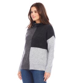 Upgrade your wardrobe with our new colorblock sweater. Made with a soft and comfortable knit design, this sweater offers a roomy fit for all-day comfort. Look stylish and feel cozy in this must-have addition to your closet. Designed for a loose fit Sweater: 74% Acrylic 22% Polyester 4% Spandex Imported Dry Clean Only Length: 23 1/2 inches (size M) Turtleneck Ribbed hem and cuff detail | Karen Kane Colorblock Sweater in Gray, Size M, Plain, Polyester/Spandex Black Knit Color Block Sweater, Black Color Block Knit Sweater, Fall Color Block Turtleneck Tops, Cozy Color Block Winter Tops, Casual Color Block Turtleneck Top, Cozy Winter Color Block Tops, Modern Fall Sweater For Layering, Cozy Winter Sweater With Color Matching, Modern Fall Layering Sweater