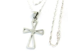 925 Sterling Silver Cross 7.8 Grams HANDMADE IN TAXCO, MEXICO This cross pendant was handmade in Taxco, Mexico from 925 Sterling silver. Taxco is world famous for its handcrafted Silver items.  It weighs about 7.8 grams.  The size of the cross --- Vertical Height- 46 mm (60 mm w/T.Ring), Horizontal crossbar- 34 mm,                                        Thickness- 1.5 mm approx. The top ring of the cross measures about 7 mm x 3~4 mm. The pendant comes with a free pouch or box. Ideal for a gift !    The chain is NOT included, it can be bought separately. To see the top and chain set, click here. To see more Cross Tops click here. To see more Chains click here. Please look in our eBay shop- "Sweeney Silver". We have a large variety of "pendant tops", "chains" & other silver jewelry & also ot T Ring, Silver Items, Sterling Silver Cross Pendant, Silver Cross Pendant, Top Rings, Sterling Silver Cross, Silver Cross, Fine Jewellery Necklace, The Cross