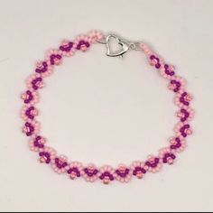 Raspberry Swirl Bracelet Fashion Minimalist New. Pink Neon Colors!!! 7.2 Inches In Length .25 Inches Wide Or 8 Inches In Length Just Send Me A Message As To Which You’re Ordering. Fashion Beads Strung Through More Than Twice To Create Durability! Beautiful Heart Clasp. Sku:A6 Everyday Beaded Heart Bracelet, Minimalist Pink Round Bracelet, Pink Crystal Bracelet For Everyday Wear, Handmade Pink Beaded Bracelets In Minimalist Style, Handmade Minimalist Pink Beaded Bracelets, Handmade Pink Minimalist Beaded Bracelets, Everyday Heart Bracelet With Round Beads, Minimalist Pink Hypoallergenic Bracelets, Pink Heart Bracelet With Round Beads In Dainty Style