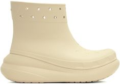 Ankle-high Croslite™ foam rubber boots in beige. Lightweight and waterproof. · Embossed detailing at vamp · Perforated detailing at collar · Logo embossed at heel tab and counter · Molded rubber footbed · Treaded rubber sole · Platform: H2.5 in Supplier color: Bone Orange Sorbet, Crocs Boots, Color Bone, Heeled Rain Boots, High Heel Rain Boots, Lingerie Bag, Shoe Boot Sandals, Buckle Boots, Rubber Boots