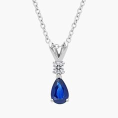 Our 18k white gold pendant holds a single round diamond that sits above an elegant pear shaped sapphire. This pendant is suspended from an 18k white gold cable-link chain. White Gold Pendant, Diamond Pendant Necklace, Precious Gemstones, Diamond Pendant, Link Chain, Gemstone Necklace, Pear Shaped, Round Diamond, Gold Pendant