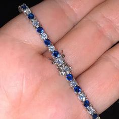 11.0ct 4mm Simulated Sapphire & Diamond D Vvs1 Tennis Bracelet 18k White Gold Over 925 Sterling Silver Unisex 4mm 6.5" - 8.0" Inches In Length 6 Times 18k White Gold Plating - Will Not Tarnish Main Stone : Created Sapphire & Diamond Stone Clarity: Vvs1 Stone Cut: Excellent Stone Size: 4mm (0.25ct/Pcs) Chain Length: 6.5 - 8.0 Inches Main Stone Shape: Round Brilliant Cut Metal: Sterling Silver Metal Purity:925 Stamp: S925 Finish: High Polished Nickel Free Lead Free Other Listings: Key Purple Oval Luxury Sapphire Tennis Bracelet With Brilliant Cut, Sapphire Color Brilliant-cut Cubic Zirconia Bracelets, Blue Tennis Bracelet With Prong Setting For Formal Occasions, Elegant Blue Bracelet With Brilliant Cut, Silver Sapphire Tennis Bracelet With Brilliant Cut, Blue Round Tennis Bracelet With Prong Setting, Blue Tennis Bracelet With Prong Setting, Blue Brilliant Cut Tennis Bracelet For Gift, Blue Brilliant Cut Tennis Bracelet Gift