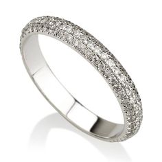 a white gold wedding ring with rows of diamonds