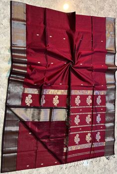 *It's a beautiful  Maheshwari Handwoven big motif saree. *100% Handloom : comes with India Handloom Mark *Washing Method : Dry Clean Recommended *Weave Type: Maheshwari *Material: Half Silk & Half Cotton *Length: Saree: 5.5 metres *Blouse Piece: 0.80 metres *Width : 46 Inches* Please note - color may be vary a little due to sunlight and photography . Please message us after purchasing in case you want fall and Pico done it not . No extra charges for fall and Pico but inform us . Blouse stitching Luxury Cotton Silk Saree With Border, Red Cotton Silk Saree With Zari Weaving, Red Cotton Silk Dupatta With Motifs, Festive Handloom Chanderi Saree, Handloom Katan Silk Saree For Puja, Red Cotton Silk Saree With Motifs, Tussar Silk Saree With Self Design For Rituals, Chanderi Saree With Cutdana For Puja, Festive Cotton Silk Dupatta For Rituals