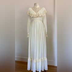 Vintage Gunne Sax Romantic Renaissance Wedding Dress 35 " Bust 30" Waist 57" Long Excellent Vintage Condition Cream Floor-length Gown With Lace Trim, Off White Maxi Length Wedding Gown, Feminine Cream Wedding Gown, White Victorian Dress With Fitted Bodice, Cream Vintage Dress For Wedding, Cream Floor-length Vintage Dress For Wedding, Cream Vintage Floor-length Wedding Dress, Cream Floor-length Vintage Wedding Dress, Empire Waist Wedding Dress With Ruffles