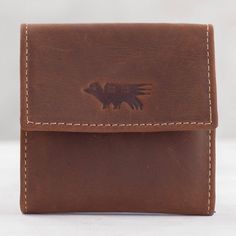 Henry and Carlos of Peru design this men's coin wallet made of rich dark brown leather with contrast stitching. The wallet features two compartments lined in dark brown polyester secured by a fold-over flap with a snap. The front flap is stamped with a stylized image of a bird. In the back of the wallet are two slots in the leather one could thread a belt through to wear the coin wallet at the waist. Imperial Leather, Best Wallet, Coin Wallet, Mens Black Leather, Womens Fashion For Work, Leather Diy, Dark Brown Leather, Leather Tooling, Wallet Men