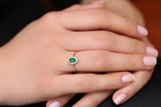 "Emerald Ring / 14k Classic Oval Cut Emerald Ring with Surrounding Diamonds / Natural Emerald Ring in 14k Solid Gold / Mothers Day Gift * If you would like to see the Matching Earrings Please Click Below https://www.etsy.com/listing/604292239/emerald-earrings-14k-oval-cut-emerald?ref=related-4 * If you would like to see the Matching Necklace Please click Below https://www.etsy.com/listing/590436480/emerald-necklace-14k-classic-oval-cut?ref=related-1 Item Features * Made to Order. * Gold KT: 14K Oval Yellow Gold Emerald Ring With Halo, 14k Gold Emerald Ring With Halo Detail, Fine Jewelry 14k Gold Emerald Ring With Halo, Timeless Oval Cluster Ring In 14k Gold, 14k Gold Halo Ring With Oval Shape, Timeless 14k Gold Oval Cluster Ring, Elegant 14k Gold Oval Cluster Ring, Oval Emerald Ring In 14k Gold For Proposal, Oval Halo Birthstone Ring In 14k Gold