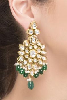 Flaunt the glam look with this pair of kundan drop glory earrings.
Handcrafted kundan
Tear drop
Sleek design
Screw back closure - Aza Fashions Glam Look, Jewellery Earrings, Glam Looks, Earrings Green, Kundan Jewellery, Online Earrings, Tear Drop, Aza Fashion, Sleek Design