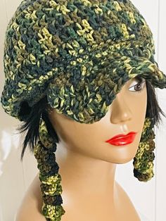 Crochet Camouflage Hat with a brim. Bonus: Free Earrings  Material: 100% Acrylic Yarn Care: machine wash and lay flat to dry  Size: one size fits most  All colors are available Adjustable Acrylic Outdoor Hats, Green Military Brimmed Hat, Green Military Bucket Hat, Green Military Style Bucket Hat, Green Crochet Hat For Outdoors, Green Crochet Hat For Outdoor, Adjustable Yarn Hat For Outdoor, Green Brimmed Crochet Hat For Outdoor, Adjustable Camouflage Military Hat