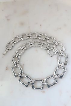 "Vintage Silver Link Choker Necklace. Length: 18\" Vintage condition! For more: https://www.etsy.com/shop/SusVintage?ref=hdr_shop_menu Don't hesitate to contact me if you have any further questions. Thank you!!" Rectangular Chunky Chain Metal Necklace, Silver Metal Chain Necklace With Rectangular Links, Silver Oval Link Metal Necklace, Vintage Style Silver Chain Necklace, Vintage Silver Chain Link Necklace, Vintage Silver Link Necklace, Silver Chunky Chain Rectangular Necklace, Silver Rectangular Chunky Chain Necklace, Silver Chunky Chain Necklace Rectangular