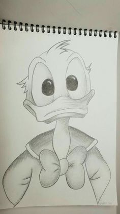 a drawing of a ducky with big eyes and an angry look on his face