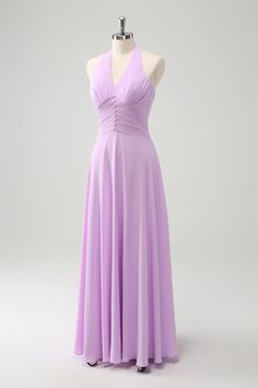 a purple dress on a mannequin dummy