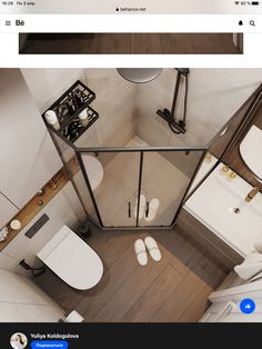 an aerial view of a bathroom with toilet, sink and shower