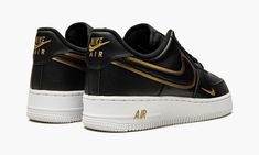 The Nike Air Force 1 Low ‘07 “Double Swoosh - Black/Gold” is a unique look for the popular lifestyle shoe by Nike with two Swooshes incorporated onto its design. Appearing in a predominantly monochromatic black colorway, the shoe’s two Swoosh logos, one on the mid-panel, the other on the forefoot, are outlined in an attention-seeking Metallic Gold trim. Moreover, the “Nike Air” embroidery on the heel and the “Air Force 1” detailing on the black nylon tongue tag both appear in Metallic Gold, as w Attention Seeking, Nike Air Force 1 Low, Stadium Goods, Air Force 1 Low, Black Nylon, Black Laces, Black Nylons, Nike Air Force 1, High Level