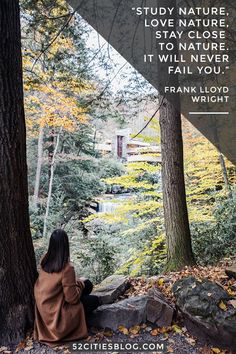 a woman sitting on the ground in front of trees with a quote from frank lloyd