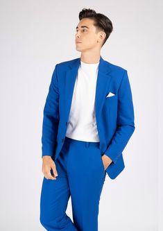 Look chic and modern in the vibrant Astor Royal Blue Stretch Suit. Crafted with a fine stretch fabric, this suit is sure to keep you comfortable while you look great doing it. Push the limits with this stylish custom look. Modern Blue Blazer For Semi-formal Occasions, Blue Notch Lapel Suit In Suiting Fabric, Modern Fitted Semi-formal Pantsuit, Modern Fitted Pantsuit For Semi-formal Events, Modern Fitted Pantsuit For Semi-formal Occasions, Royal Blue Single Breasted Suit For Work, Tailored Single Breasted Blue Suit, Tailored Single-breasted Blue Suit, Blue Business Casual Suit With Notch Lapel