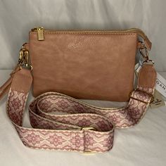 Vegan Leather Crossbody Bag Doubles As A Clutch Or Wristlet Pretty Adjustable And Removable Woven Crossbody Strap Wristlet Strap Is Also Removable Nwt In New Condition Never Used Calin Collection Peta Approved Vegan Leather Material See Images For Sizing Offers Welcome! Light Pink Cream Trendy Wristlet With Adjustable Strap, Trendy Rectangular Wristlet With Adjustable Strap, Pink Clutch With Removable Pouch For Everyday, Pink Wristlet With Removable Pouch, Blush Crossbody Shoulder Bag With Adjustable Strap, Pink Pouch Clutch With Detachable Strap, Pink Pouch Clutch With Wrist Strap, Pink Wristlet With Removable Pouch For Everyday Use, Travel Crossbody Bag With Wrist Strap