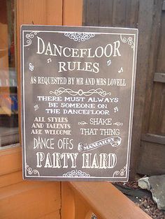 a sign that is on the side of a building saying dancefloor rules as required by mr and mrs lovell