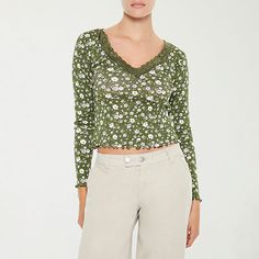 You'll love this Forever 21 women's and junior's long-sleeve t-shirt for its delicate lace trim and ribbed floral-print finish. This fitted pullover tee is made from 100% cotton and comes complete with a v-neckline and lettuce trims for a feminine touch. Wear it with jeans.Closure Type: Pullover HeadFit: FittedNeckline: V NeckSleeve Length: Long SleeveSleeve Style: Fitted SleeveFiber Content: 100% CottonCare: Dry Flat, Hand WashMaterial: CottonCountry of Origin: Imported Cheap Forever 21 Cotton Blouse, Fitted Lace Top T-shirt For Spring, Casual Cotton T-shirt With Lace Trim, Fall Crew Neck Tops With Lace Trim, Spring Cotton Tops With Lace Trim, Casual Stretch Tops With Lace Trim, Casual T-shirt With Lace Trim For Spring, Fall Relaxed Fit Top With Lace Trim, Relaxed Fit Lace Trim Top For Fall